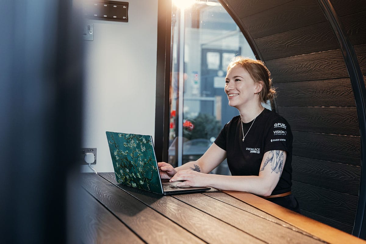 Employee using an external meeting pod